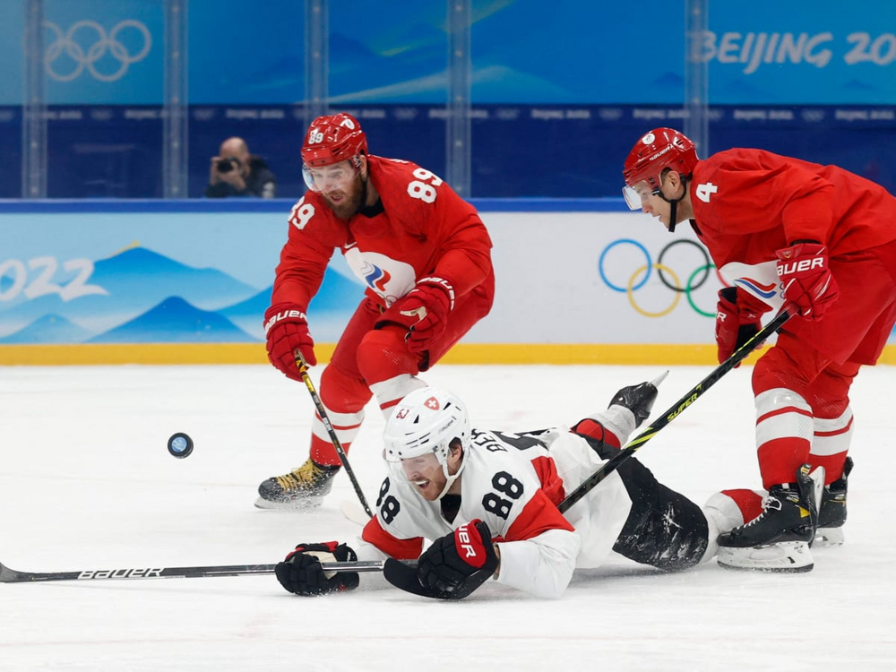 Олимпийские игры хоккей мужчины. Хоккеисты сборной Швейцарии. Сборная Швейцарии по хоккею на ОИ 2014. Хоккейная сборная Швейцарии. Россия Швейцария хоккей.